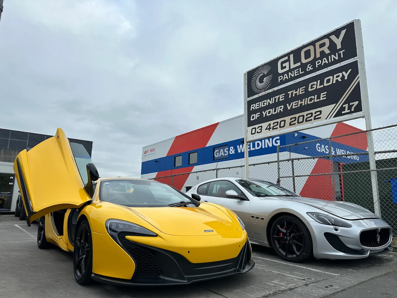Yellow McLaren and Maserati at GLORY Panel & Paint, Christchurch